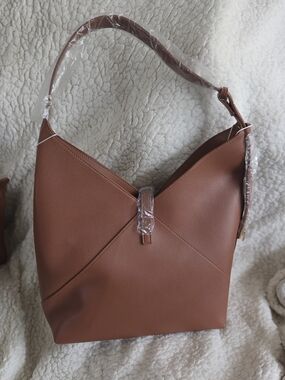 Structured Brown Shoulder Bag with Modern V-Shaped Front